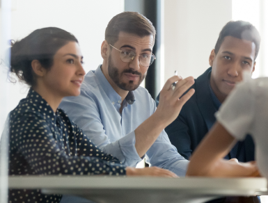 Four people in a group discussion