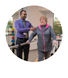 Medical professional working with a patient on physical rehabilitation
