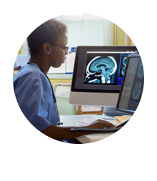 Radiology professional reviewing test results of a patient's head