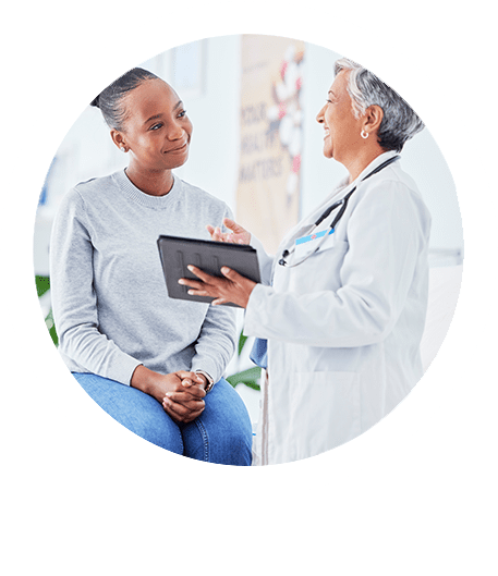 Urologist talking to a patient